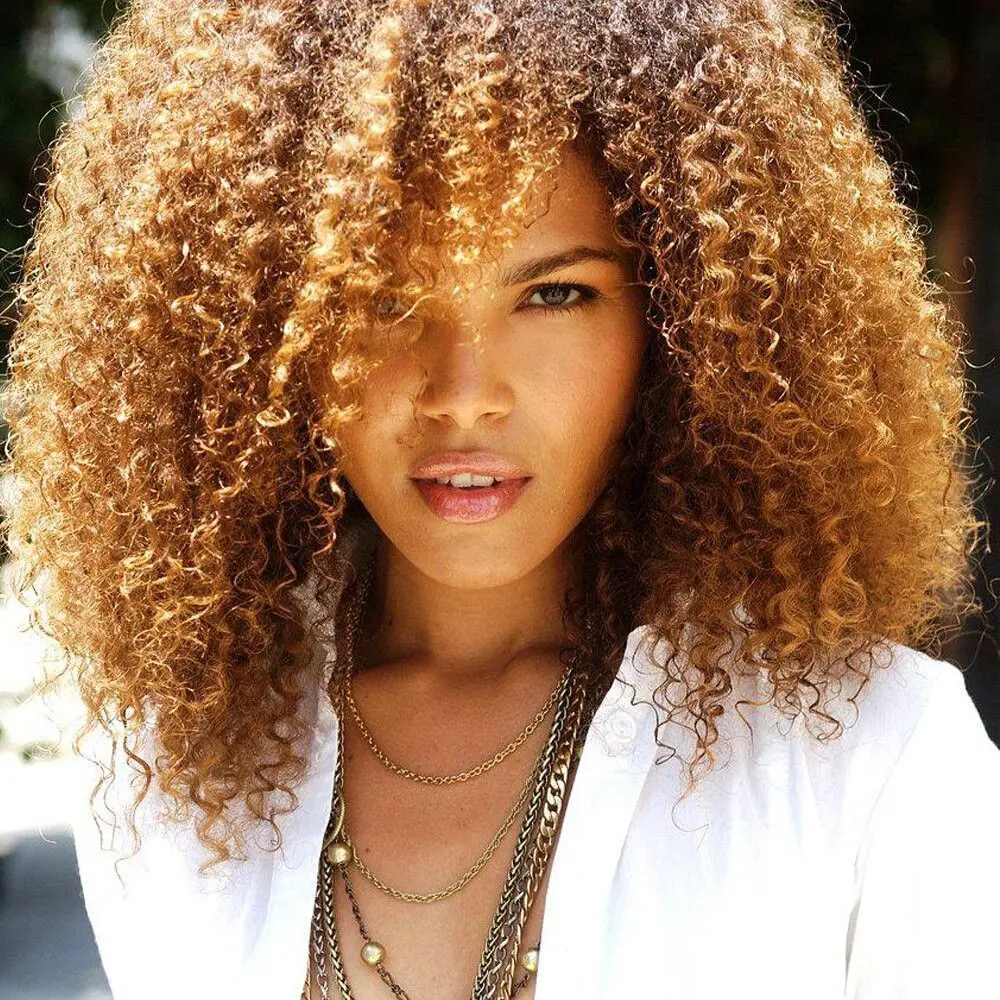 MECHAS-EN-CABELLO-RIZADO-DORADOS-Y-DORADOS-COBRIZOS-PELUQUERIA-MOURE-MALLORCA-2