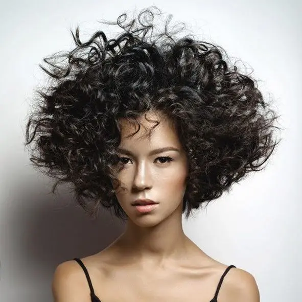 corte-media-melena-pelo-rizado-estilo-evase-moure-palma-2